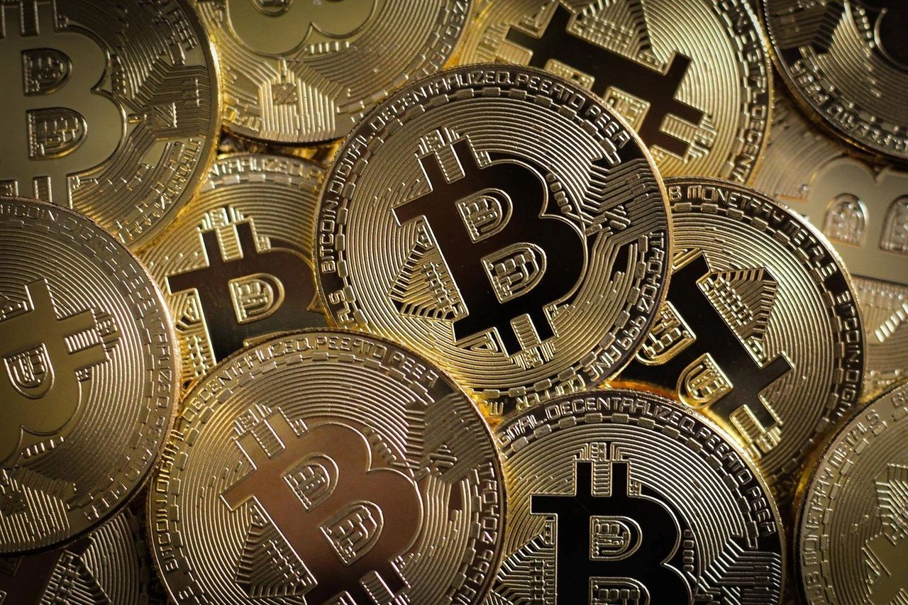 A close-up photo of gold bitcoins.