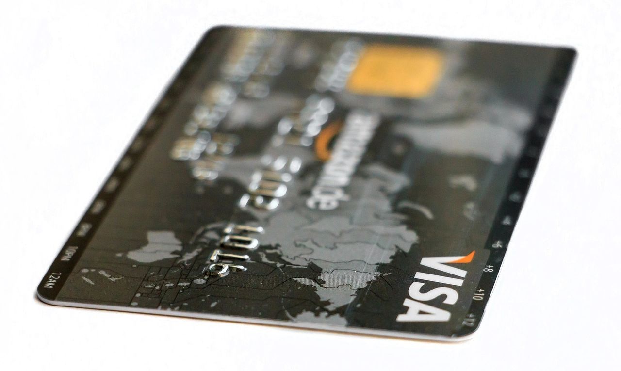 A blurry photo of a sample Visa credit card