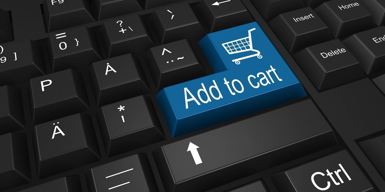A keyboard with the enter key replaced a visual that says: "Add to cart"